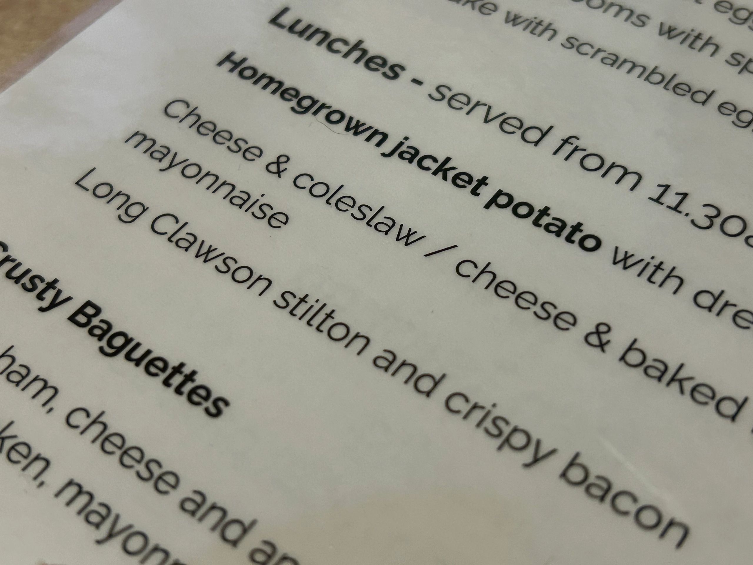 Printed restaurant menu close-up